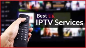Person enjoying premium IPTV content on a smart TV with a remote control, showcasing the best UK IPTV service providers of 2023
